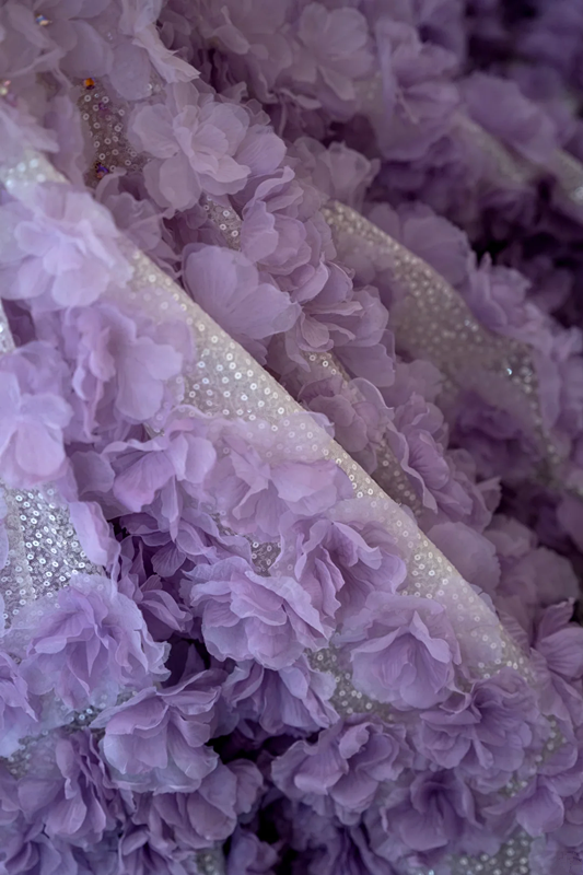 White strapless fitted waist long ball gown with purple floral maxi skirt R8899