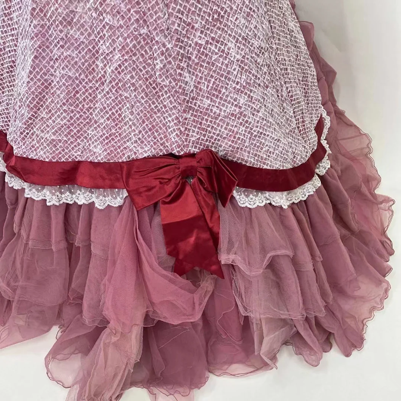 Pink strapless ball gown with a cinched waist and an A-line skirt; bridal gown R7296