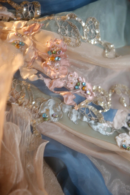 Light blue strapless, waist-cinched ball gown with a puffy skirt; bridal gown R7278