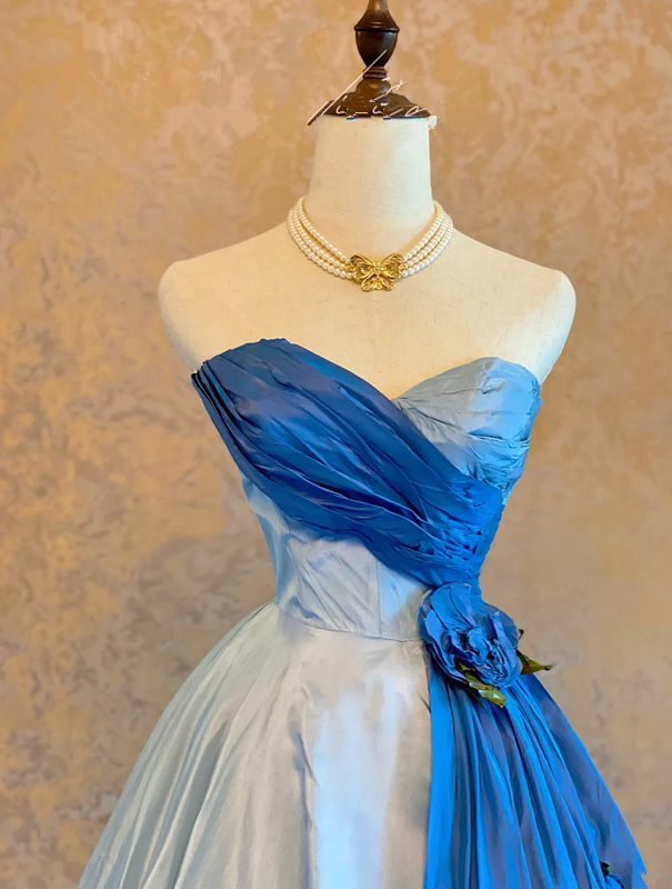 Blue color-block strapless ball gown with a cinched waist and an A-line skirt; bridal gown R7304