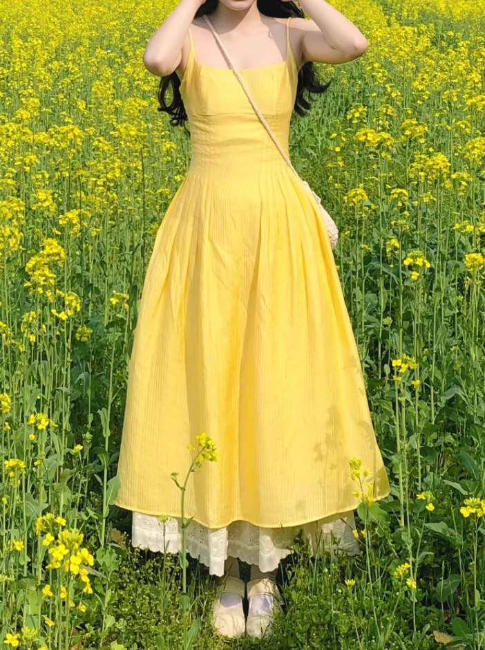Travel wear women's yellow suspender dress gentle temperament super beautiful waist skirt R0437