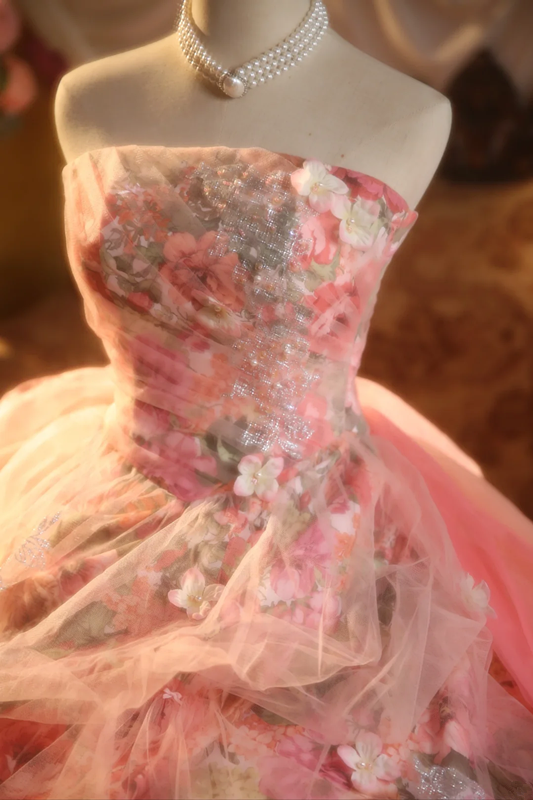 Pink floral-patterned strapless ball gown with a cinched waist and a voluminous puffy skirt; bridal gown R7285