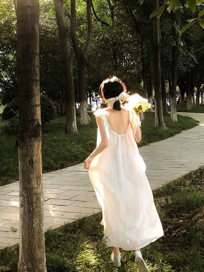 White moonlight three-dimensional suspender dress 2025 new irregular white niche long skirt R0160