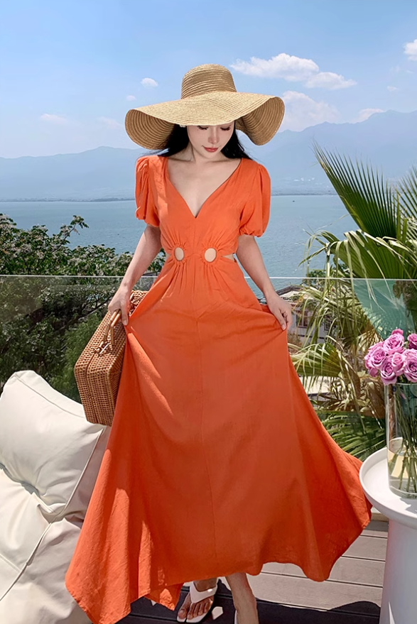 Orange V-neck French puff sleeve dress Hot girl hollow waist design high-end seaside holiday dress R0202