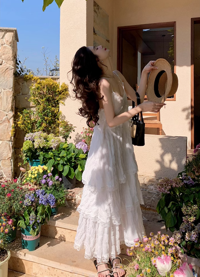 White dress seaside holiday beach dress high-end age-reducing suspender long dress R1700