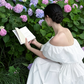 White off‑the‑shoulder ruffled neckline, waist‑cinching, sexy long ball gown R8000