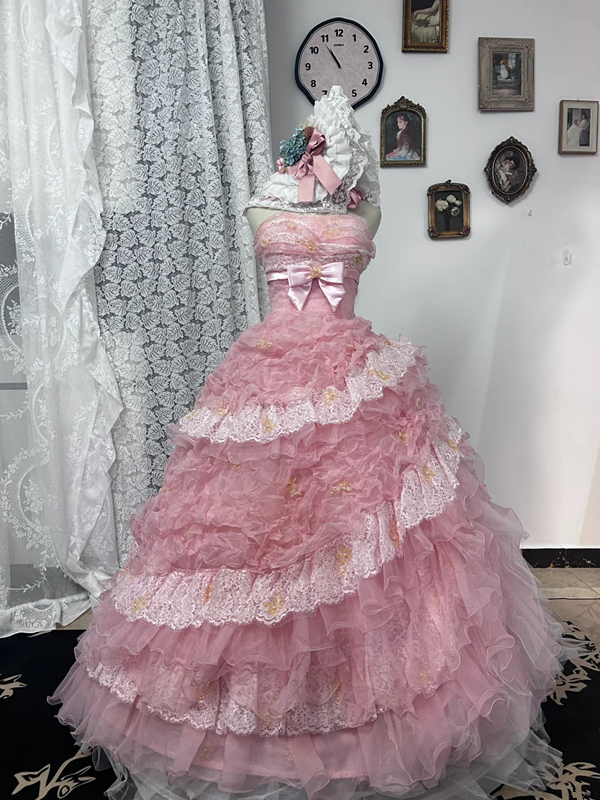 Light pink strapless fitted waist ball gown with a full tiered skirt, bridal gown R7248