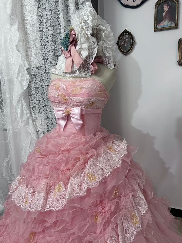 Light pink strapless fitted waist ball gown with a full tiered skirt, bridal gown R7248