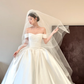White satin one-shoulder slim waist and plump skirt long bridal dress R6057
