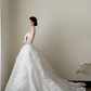 White strapless, waist‑cinching, slim‑fit, long fluffy ball gown with an elegant temperament, wedding dress R8001