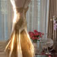 Light brown halter-neck fitted long ball gown with an asymmetrical hem R7763