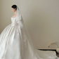White strapless, waist‑cinching, vintage‑patterned, long ball gown with a fluffy skirt, wedding dress R8002