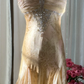 Light brown halter-neck fitted long ball gown with an asymmetrical hem R7763
