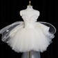 White strapless, fitted waist, short ball gown with a full skirt R8954