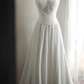 White strapless, fitted, long ball gown with pleats R6698