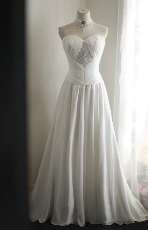 White strapless, fitted, long ball gown with pleats R6698