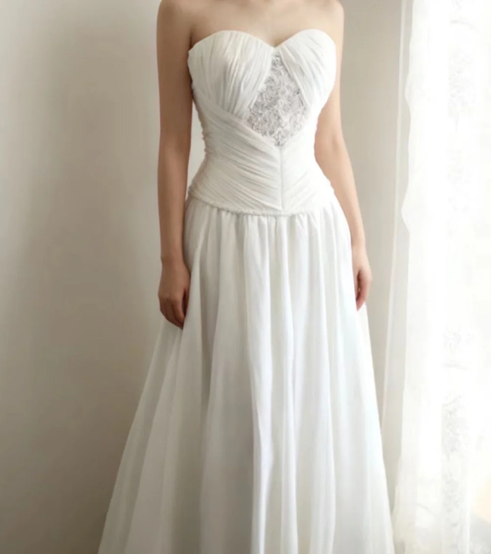 White strapless, fitted, long ball gown with pleats R6698