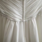 White strapless, fitted, long ball gown with pleats R6698