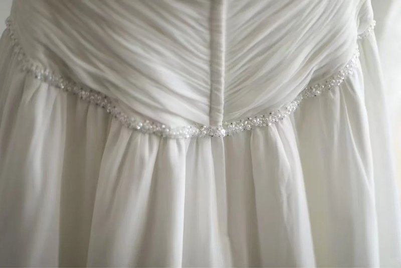 White strapless, fitted, long ball gown with pleats R6698