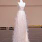 Light pink strapless, fitted waist, long ball gown with feather skirt design; bridal gown R8345