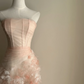 Light pink strapless, waist‑cinched, slim‑fit, ruffled‑hem long prom dress R7964
