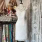 White sleeveless halter neck fitted short ball gown R7457