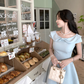 Light blue bow dress with short sleeves, slim waist and elegant short skirt R4419