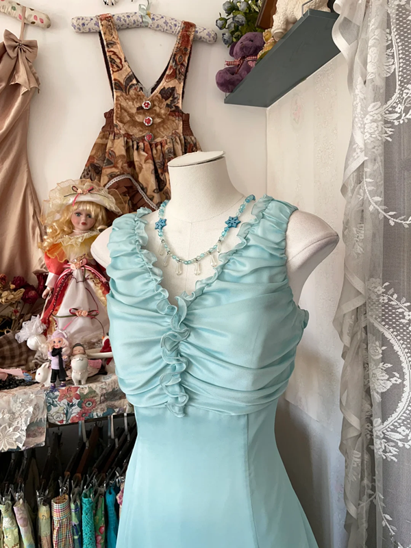 Light blue sleeveless A-line mini dress with a fitted waist, a prom dress R6341