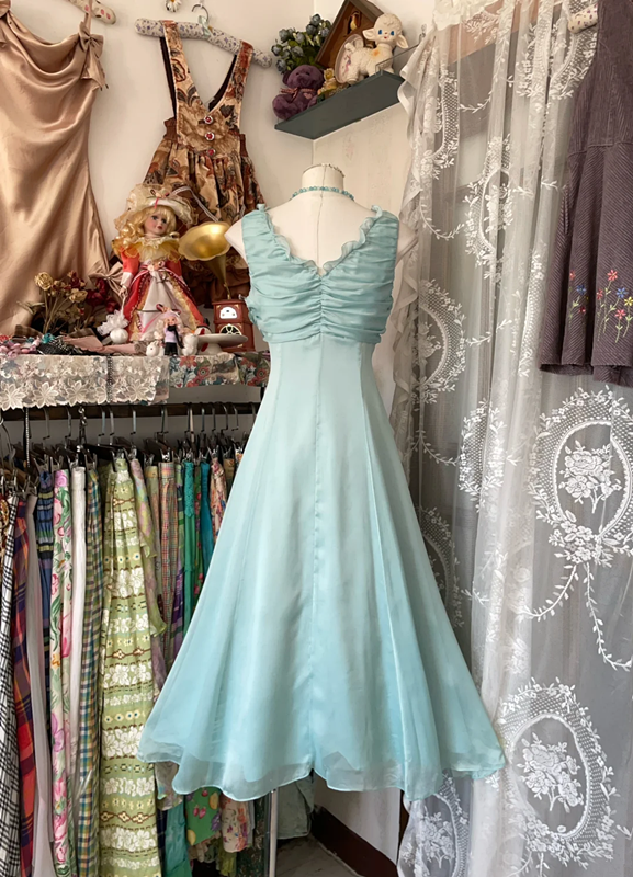 Light blue sleeveless A-line mini dress with a fitted waist, a prom dress R6341