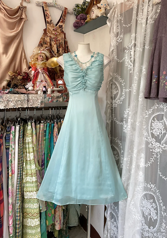 Light blue sleeveless A-line mini dress with a fitted waist, a prom dress R6341
