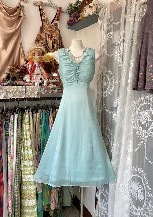 Light blue sleeveless A-line mini dress with a fitted waist, a prom dress R6341