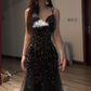 Sexy ball gown with black halter neck, fitted waist, and sequined fishtail skirt. R8065