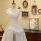 White strapless, fitted, long ball gown with an asymmetrical hem; bridal gown R7175