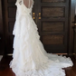 White lace square-neck long-sleeve ball gown with a cinched waist, vintage style and tiered cake skirt; bridal gown R7295