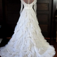 White lace square-neck long-sleeve ball gown with a cinched waist, vintage style and tiered cake skirt; bridal gown R7295