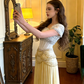 White bodice with rhinestone embellishments and a light yellow skirt, long ball gown/bridal dress R8595