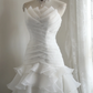 White strapless, fitted, long ball gown with a tiered skirt; bridal gown R6822