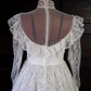 White lace square-neck long-sleeve ball gown with a cinched waist, vintage style and tiered cake skirt; bridal gown R7295