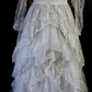 White lace square-neck long-sleeve ball gown with a cinched waist, vintage style and tiered cake skirt; bridal gown R7295