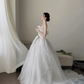 White strapless waist‑cinched slim‑fit ball gown with a full ruffled skirt, wedding dress R8008