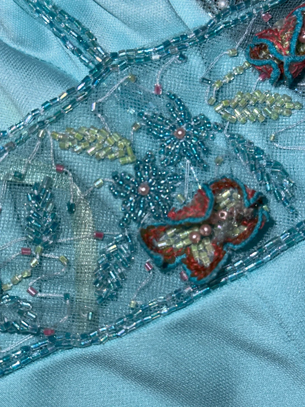 Light blue halter neckline with beaded details, fitted waist, elegant long ball gown R6903