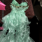 Light green halter-neck fitted ball gown with an asymmetrical hem R7045