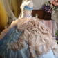 Light blue strapless, waist-cinched ball gown with a puffy skirt; bridal gown R7278