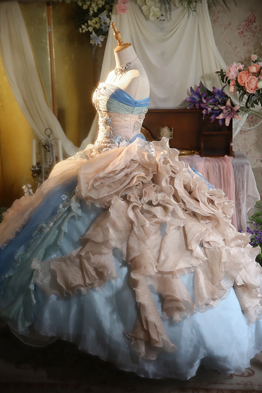 Light blue strapless, waist-cinched ball gown with a puffy skirt; bridal gown R7278