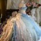 Light blue strapless, waist-cinched ball gown with a puffy skirt; bridal gown R7278
