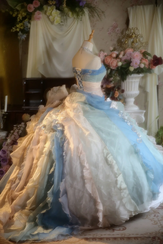 Light blue strapless, waist-cinched ball gown with a puffy skirt; bridal gown R7278