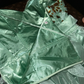 Light green halter-neck fitted ball gown with an asymmetrical hem R7045