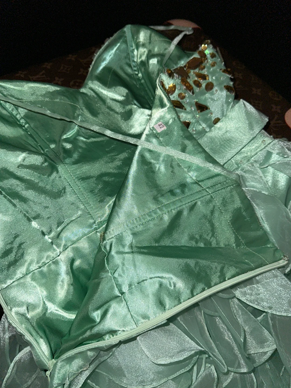 Light green halter-neck fitted ball gown with an asymmetrical hem R7045