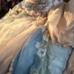 Light blue strapless, waist-cinched ball gown with a puffy skirt; bridal gown R7278