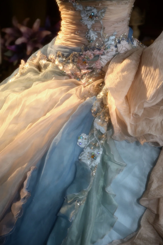 Light blue strapless, waist-cinched ball gown with a puffy skirt; bridal gown R7278